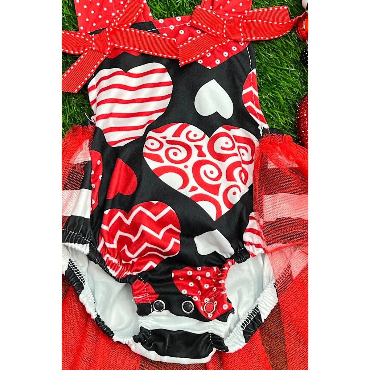 MULTI-PRINTED HEART BABY ONESIE WITH TULLE SKIRT. LC-RP-2116089-WENDY