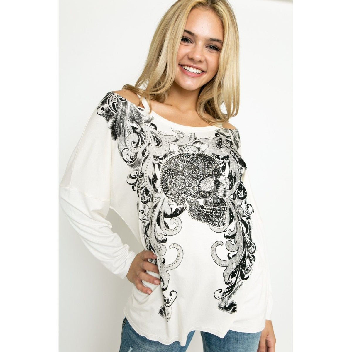 CUT OUT LONG SLEEVE TOP WITH SKULL AND STONES