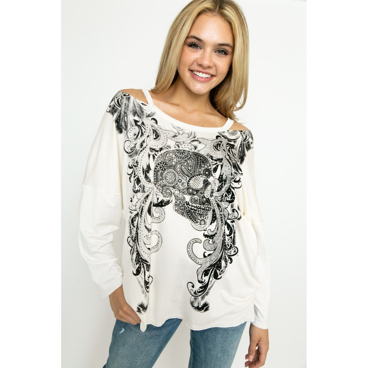 CUT OUT LONG SLEEVE TOP WITH SKULL AND STONES