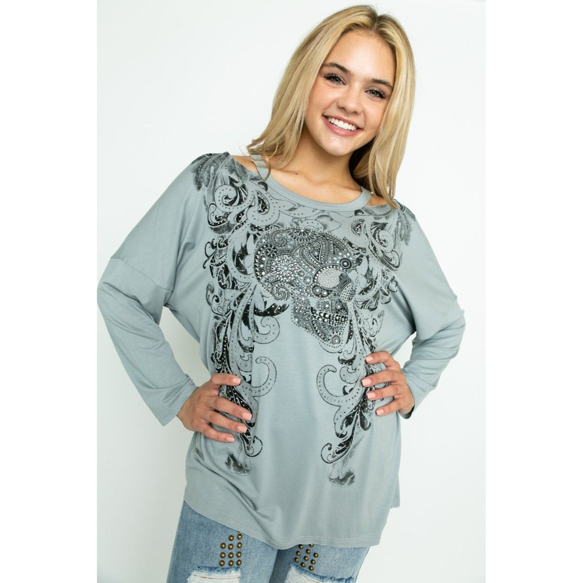 CUT OUT LONG SLEEVE TOP WITH SKULL AND STONES